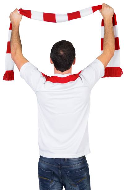 istock Cheering football fan in white 842217746