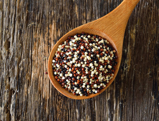 istock Quinoa seeds in spoon on wood 842219936