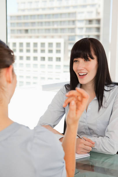 istock Both women enjoy a joke with one another 842223544