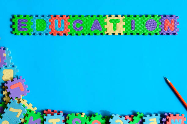 istock top view jigsaw with toys and children learn 842225294