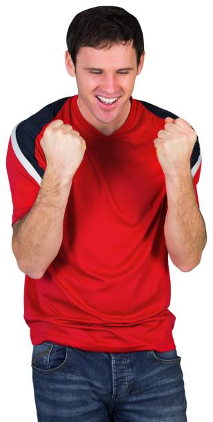istock Cheering football fan in red 842227876