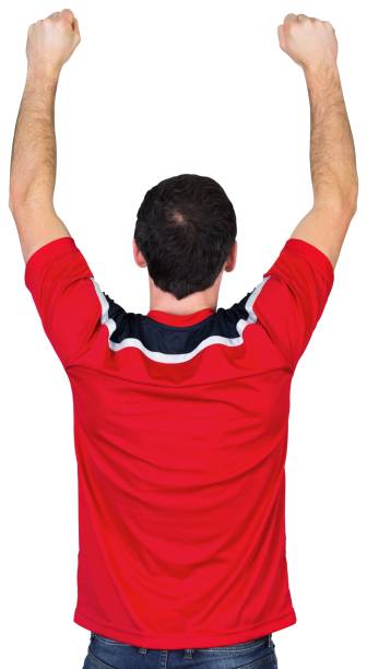 istock Cheering football fan in red 842227934
