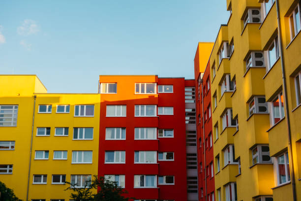 istock yellow and red colored houses in a big living complex 842228086