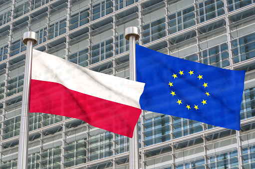 European Union and Luxembourg flags waving in front of the Chamber of Deputies - Luxembourg City, Luxembourg