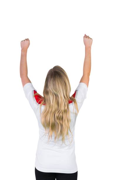 istock Pretty football fan in white cheering 842235512