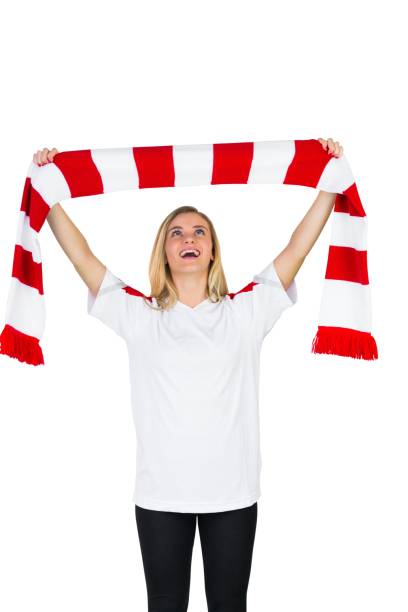 istock Pretty football fan in white cheering 842235522