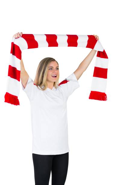 istock Pretty football fan in white cheering 842235528