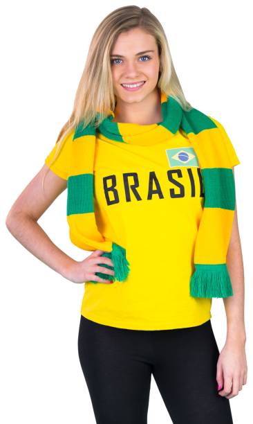 istock Pretty football fan in brasil tshirt 842235700