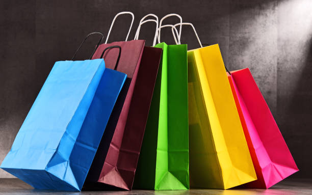 istock Composition with colorful paper shopping bags 842238036
