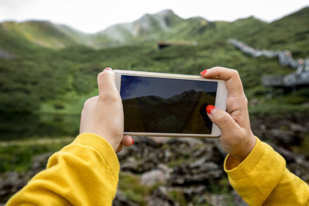 istock taking photo with smart phone 842242080