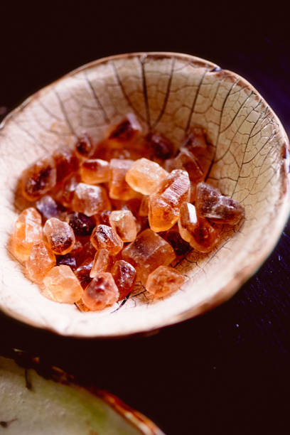 istock Brown caramelized sugar in a plate made of clay handmade.Macro 842244858