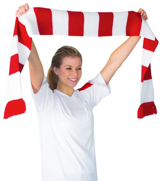 istock Pretty football fan in white cheering 842247160