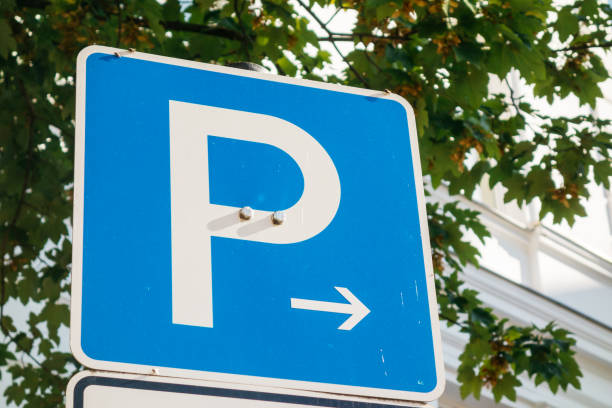 istock blue parking sign with small arrow 842247370
