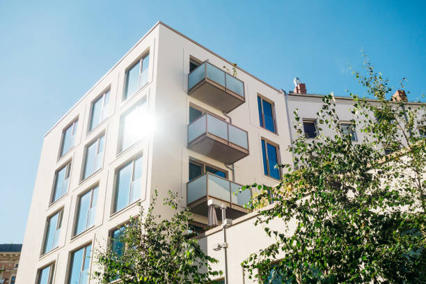 istock big apartment block with glass balcony 842250960