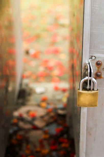 istock metal door with Thick metal padlock on 842251304
