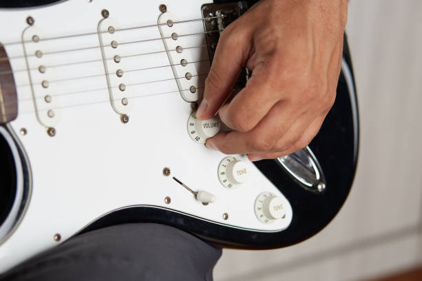 istock Close up of a lefty electric guitar being played 842263418
