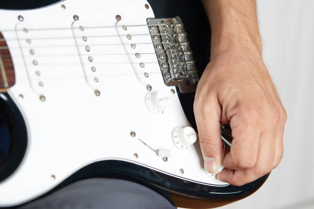 istock Close up of a lefty electric guitar being played 842263562