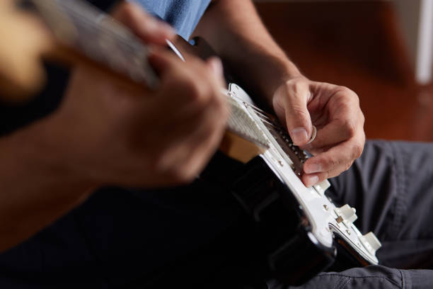 istock Close up of a lefty electric guitar being played 842265604