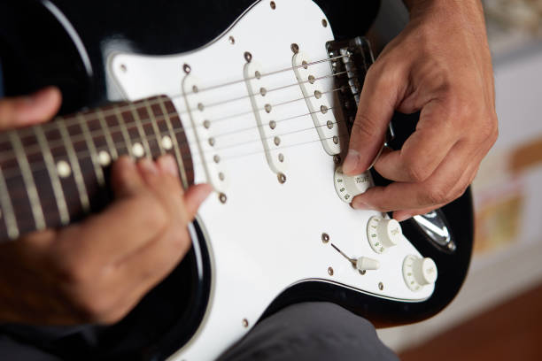 istock Close up of a lefty electric guitar being played 842265642