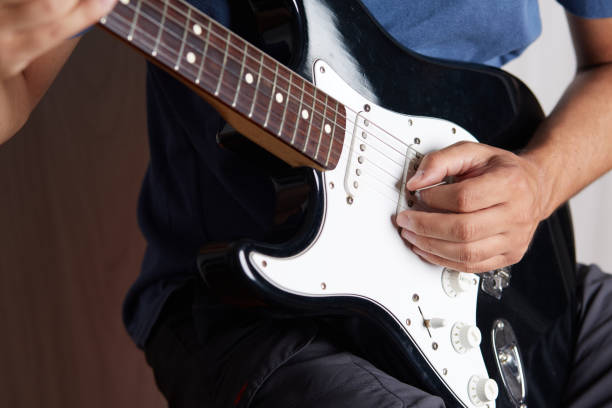 istock Close up of a lefty electric guitar being played 842265676