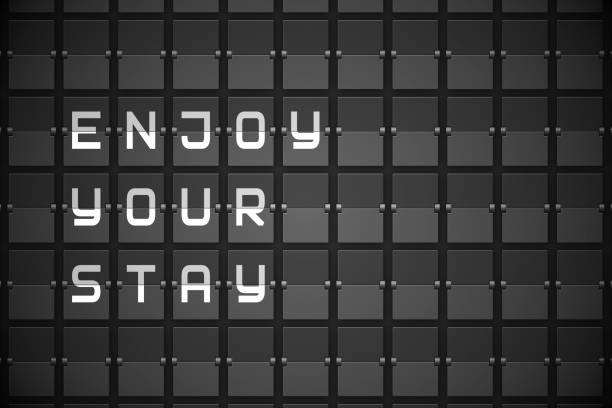 istock Enjoy your stay on black mechanical board 842266278