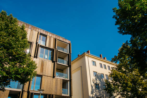 istock modern house next to an older one 842266288