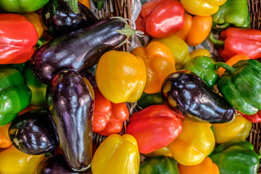 Colorful set of red, yellow and green pepper eggplants