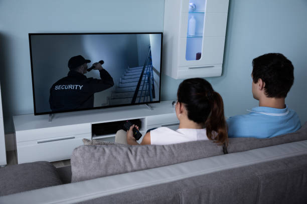 istock Couple Watching Film On Television 842272266