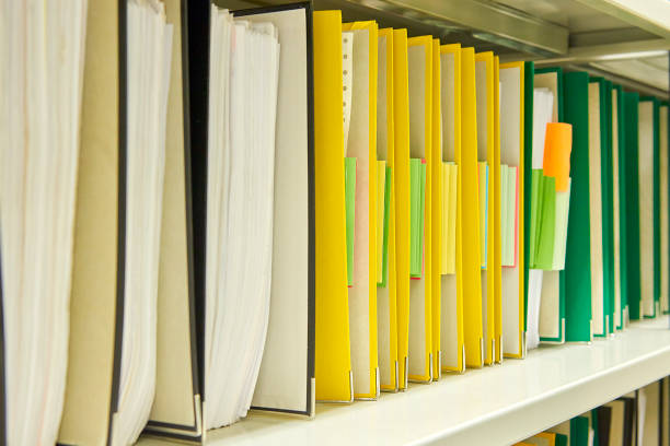 istock Yellow and green file folders in archive 842273778