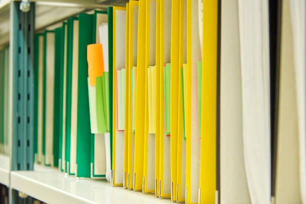 istock Yellow and green file folders in archive 842273784