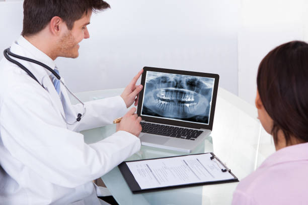 istock Female Patient Consulting Doctor 842286962
