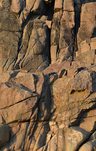 A detail of a granite cliff face