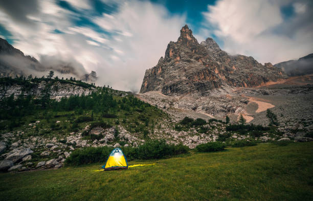 istock Tourist tent in mountains 842287674