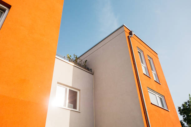 istock low angle view of modern red townhouses 842289380