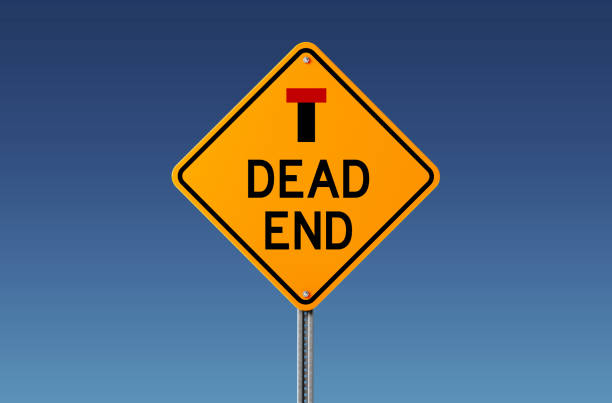 istock Yellow Dead End Ahead Traffic Sign on Blue Sky 842299988