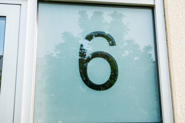 istock number six on glass door 842299998