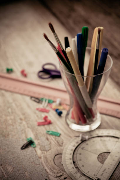 istock Business back to School background with white paper as a copy space, brushes, ruler on old wooden table background 842308714