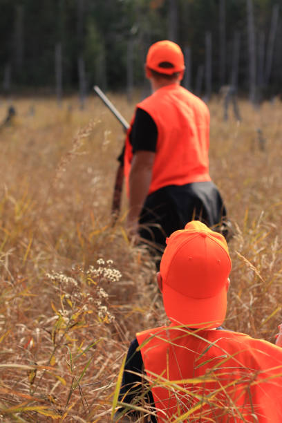 istock Father and son are hunting 842311062