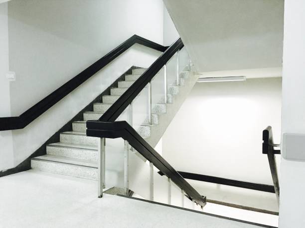istock Empty White Stairs with Black Banister in A Building 842312174