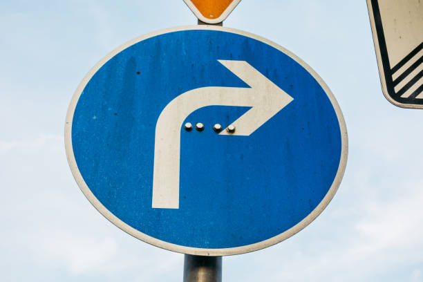 istock white arrow on blue traffic sign showing to the right 842317792