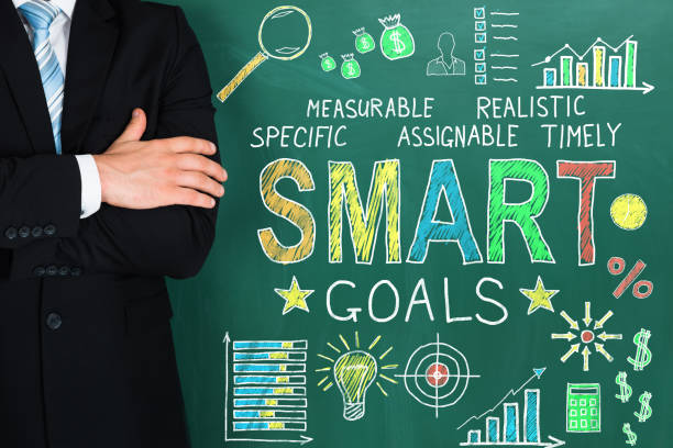 istock Businessman Standing Over Green Background 842319496