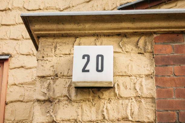istock light door sign with number twenty 842324376
