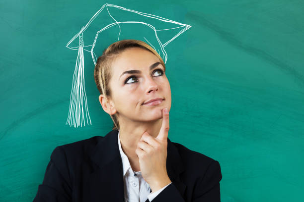 istock Thoughtful Young Businesswoman Looking Up 842324760