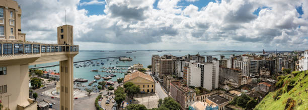 panoramic view over the bay of Salvador with elevator panoramic view over the bay of Salvador da Bahia with elevator Lacerda lacerda elevator stock pictures, royalty-free photos & images
