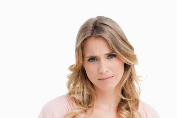 istock Serious young woman looking at the camera 842331248