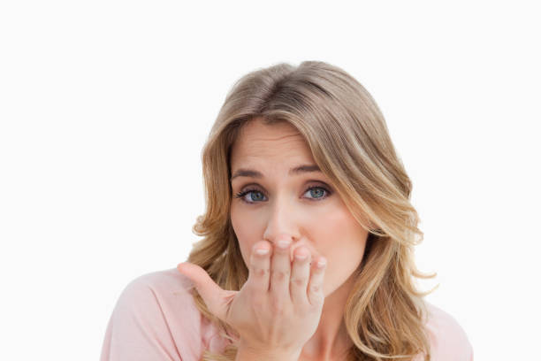 istock young blonde woman sending a kiss 842336902