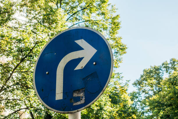 istock blue traffic sign with white arrow 842337626