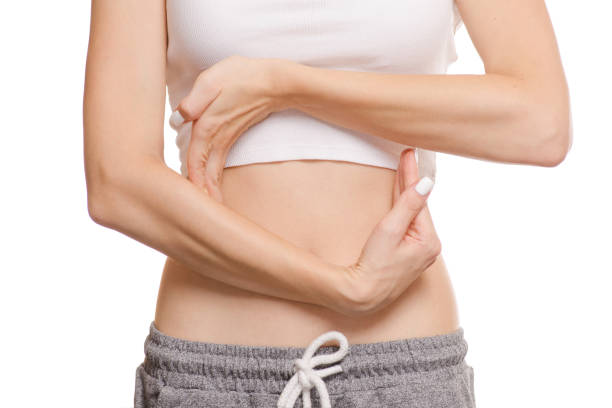 istock Female hands belly circling stomach 842343250