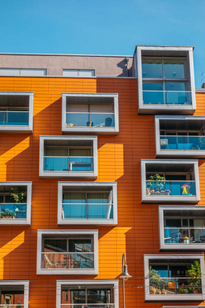 istock high angle format of orange apartment building 842343254