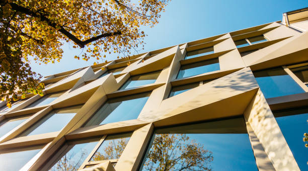 istock very futuristic facade in low angle view at autumn 842343808